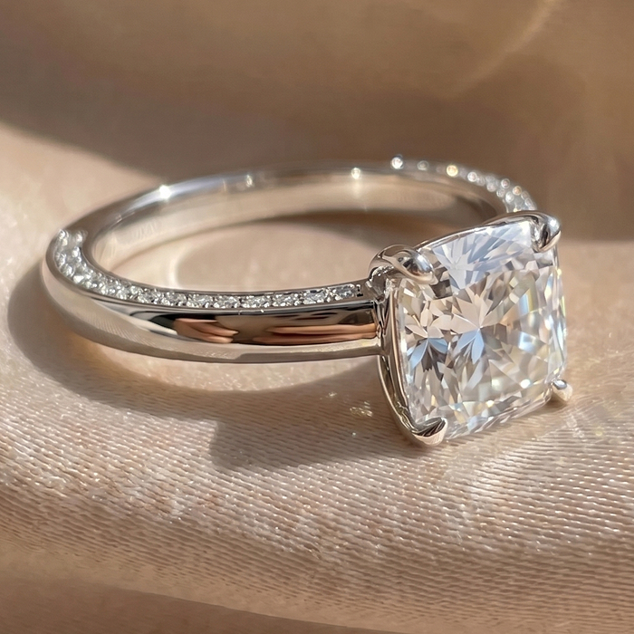 Cushion solitaire engagement ring