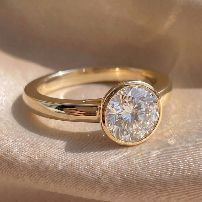 Round solitaire engagement ring